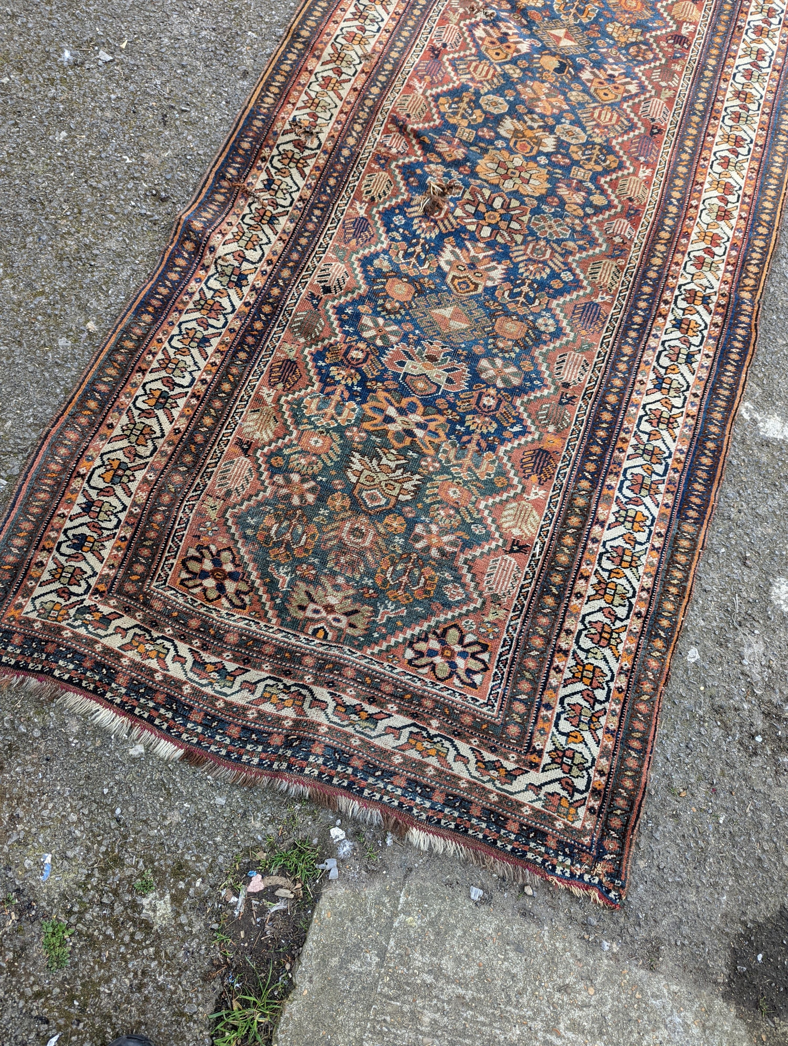 A North West Persian blue ground runner, 300 x 109 (worn and holed) a North West Persian rug, Bohara rug and mat
